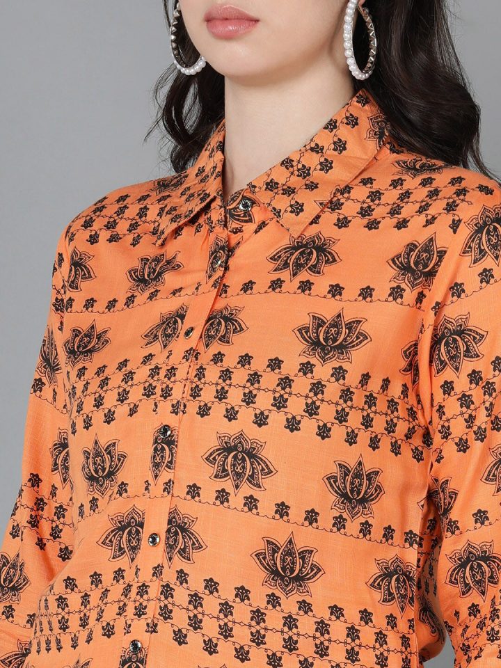 d6a00d9f-d65e-4b0d-916e-8d2a1e5cb1221688747323150WomenFitandFlareOrangeandBlackTopandSkirtSet2